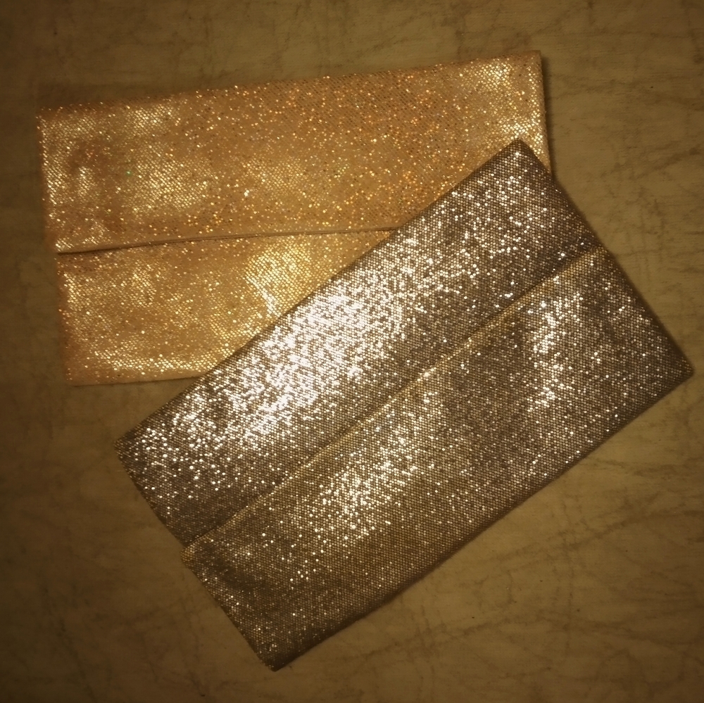 Glitter envelope clutches